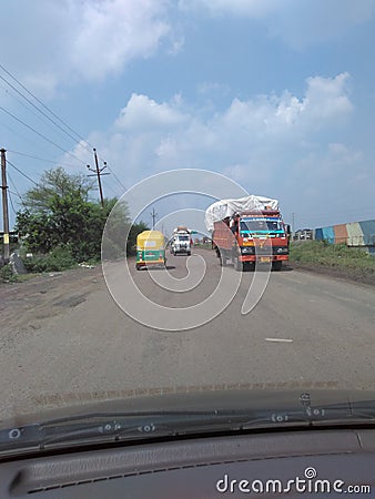 Vehicles of Indian National Highway after rainy season Editorial Stock Photo
