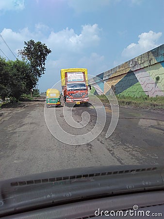 Vehicles of Indian National Highway after rainy season Editorial Stock Photo