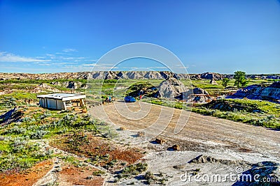 Vehicles in the parking lot at Dinosaur Provincial Park Editorial Stock Photo