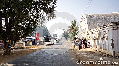 Vehicles and people on the road in Bagan, Myanmar Editorial Stock Photo