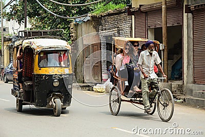 Vehicles run on street in Amritsar, India Editorial Stock Photo
