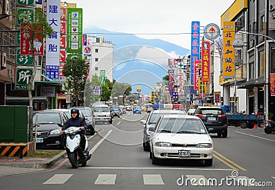 Vehicles run on street in Tainan, Taiwan Editorial Stock Photo