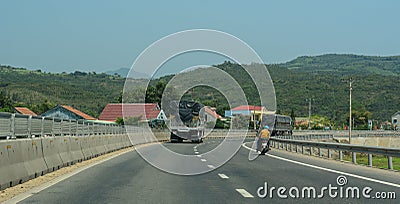 Vehicles running on the Highway Number 1 in Da nang, Vietnam Editorial Stock Photo