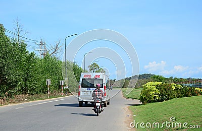 Vehicles running on street in Phu Quoc, Vietnam Editorial Stock Photo