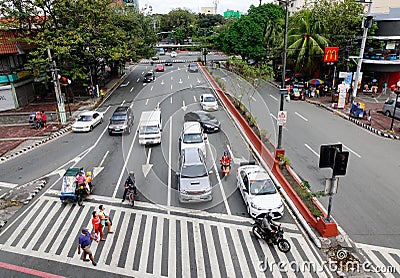 Vehicles stopping on street in Manila, Philippines Editorial Stock Photo