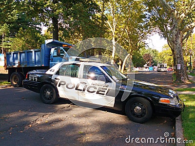 Police Car Blocking the Road, Protecting the Labor Day Street Fair, Rutherford, NJ, USA Editorial Stock Photo