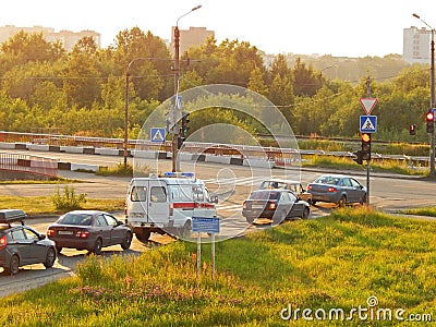 Vehicles waiting for the green light at a crossroads Editorial Stock Photo