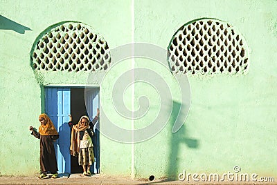 Veiled girls by mosque in harar ethiopia Editorial Stock Photo