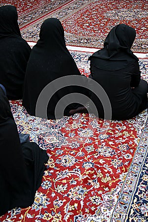 Veiled women in mosque Stock Photo