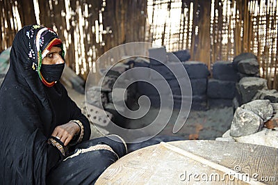 Veiling Bedouin woman Editorial Stock Photo