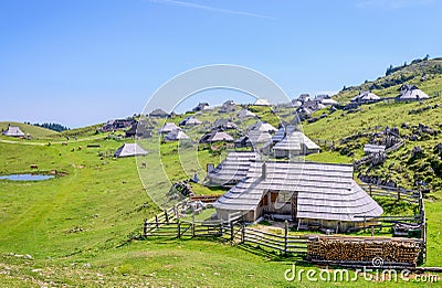 Velika planina plateau, Slovenia, Mountain village in Alps, wooden houses in traditional style, popular hiking Stock Photo