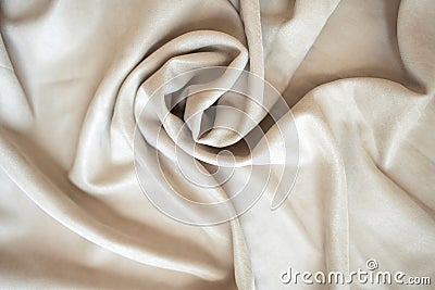 Velour background with drapery the color of coffee and milk. Blackout curtains on velour background with pleats. Stock Photo