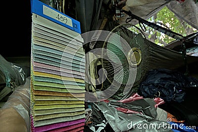 Velvet fabric sample local market retail booth Stock Photo