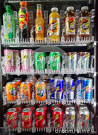 Vending machine with canned and bottled drinks. London, England. Editorial Stock Photo