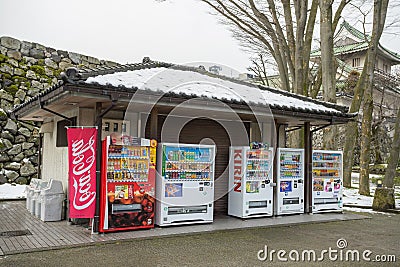 Vending machines in front of Toyama castle Editorial Stock Photo