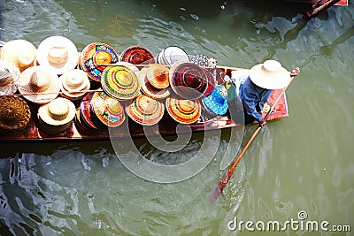 Vendor on floating market in Thailand Stock Photo