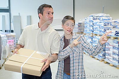 Vendor hardware giving direction for customer Stock Photo