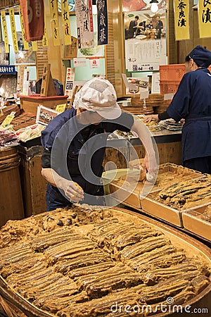 Vendor preparing the pickled vegetable at the stand Editorial Stock Photo