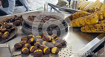 A vendor sell roasted corn and chestnuts Stock Photo