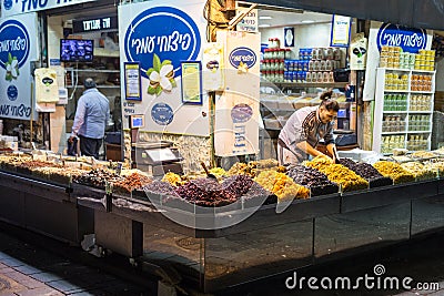 Vendor selling spices sold at the Machane Yehuda Market in Jerusalem, Israel Editorial Stock Photo