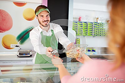 Vendor selling sweets Stock Photo