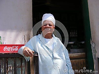 Vendor in traditional wear dress in Country side near river Nile cairo Editorial Stock Photo