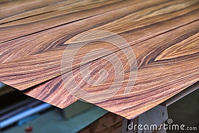 Veneer Santos Rosewood. Wood texture. Woodworking and carpentry production Stock Photo