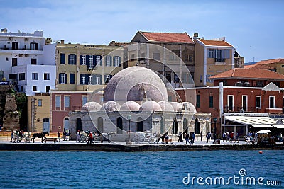 The Venetian Harbor with a view of the kyuchuk-Hasan mosque janissary mosque, the embankment with people walking and carriages w Stock Photo