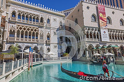 Venetian Hotel in Las Vegas with gondoliers and tourists on gondolas. Nevada, Editorial Stock Photo