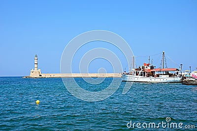 Venetian lighthouse and harbour, Chania. Editorial Stock Photo