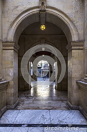 Venetian Loggia, interior view. Looking through the arches from the courtyard to the 25th August street Editorial Stock Photo