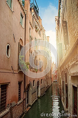Venetian water canal with boat. Venice Italy Stock Photo