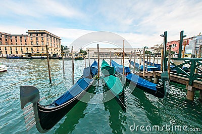 Gondola boat and Venice Santa lucia railway station ferrovia, It Editorial Stock Photo