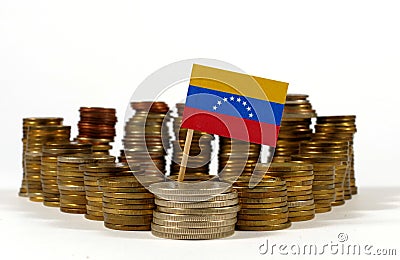 Venezuela flag with stack of money coins Stock Photo