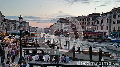 venice canal rialto bridge view people boats sunset Editorial Stock Photo