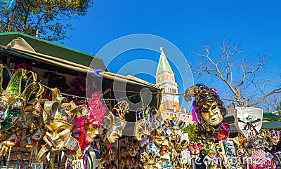 Venice carnival masks and gifts at kiosk displayed for sale on vendor stand Editorial Stock Photo