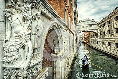 Venice cityscape with ancient sculpture, Italy Editorial Stock Photo