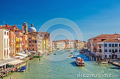 Venice cityscape with Grand Canal waterway. View from Scalzi bridge. Gondolas, boats, yachts, vaporettos Editorial Stock Photo