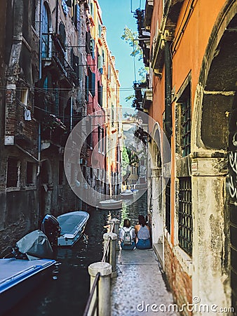 Venice cityscape, narrow water canal, bridge and traditional buildings. Italy Editorial Stock Photo