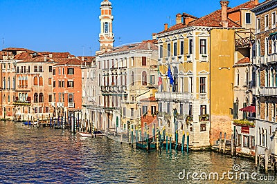 Venice cityscape, narrow water canal, campanile church on background and traditional buildings. Italy, Europe. Stock Photo