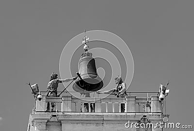 Venice, Clock and bell tower in Renaissance style in San Marco square with the statues called Mori di Venezia, UNESCO world Stock Photo