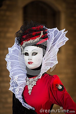 Venice - February 6, 2016: Colourful carnival mask through the streets of Venice Editorial Stock Photo