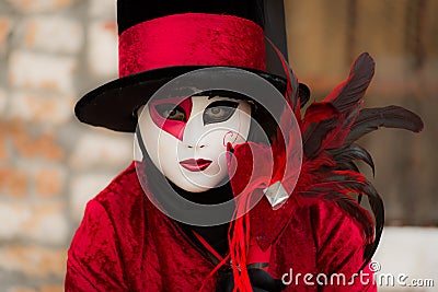 Venice - February 6, 2016: Colourful carnival mask through the streets of Venice Editorial Stock Photo