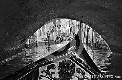 Venice Gondola Under Bridge BW Stock Photo