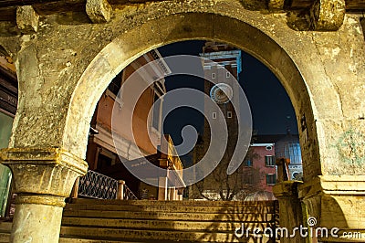 Venice Italy arch over stair bridge at night Stock Photo