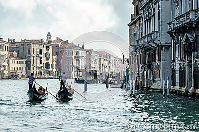 VENICE, ITALY/EUROPE - OCTOBER 12 : Gondolier ferrying people in Editorial Stock Photo