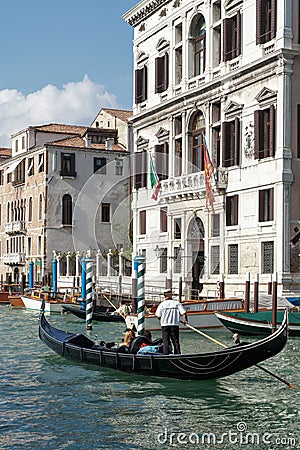 VENICE, ITALY/EUROPE - OCTOBER 12 : Gondolier ferrying people in Editorial Stock Photo