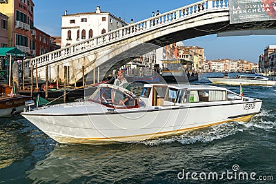 VENICE, ITALY/EUROPE - OCTOBER 12 : Motorboat cruising down the Editorial Stock Photo