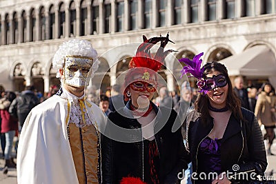 VENICE / ITALY - February 6 2016: Carnival performers participate this event in Piazza San Marco in Venice, Italy. The tradition b Editorial Stock Photo