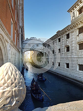 Venice, Italy. Gondolas in a romantic narrow canal. Bridge of sighs Stock Photo